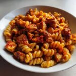 pasta featuring tender cubed chicken fillets mixed