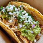 Authentic Mexican Chicken Street Tacos with Fresh Guacamole and Crumbled Cheese