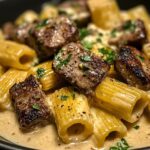 Rigatoni in Garlic Butter Parmesan Cream Sauce with Cajun Steak Tips