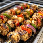 Turkish Chicken Kebab featuring succulent grilled chicken cubes threaded on skewers with charred bell peppers and onions