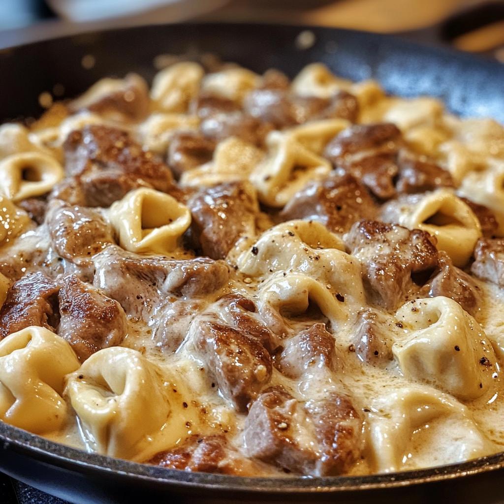 garlic steak cheese filled tortellini skillet